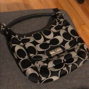 Signature authentic shoulder coach purse.